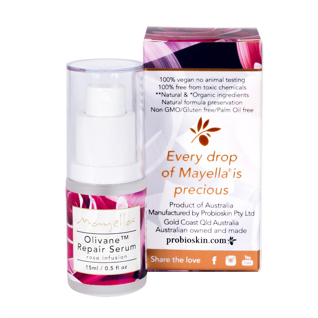 bottle of olivane repair serum rose infusion next to its box on a white background