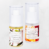 bottle of cleansing serum on olivane repair serum citrus infusion on a grey background
