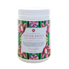 tub of ginger kisses tisane with a pink, green and purple floral design on a white background